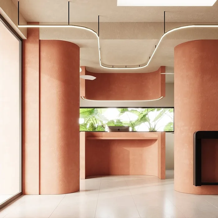 Curved terracotta volumes and natural light